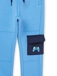 Джоггеры голубые с контрастным карманом от бренда DPAM