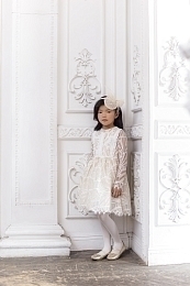 Ободок молочного цвета с бантом от бренда Eirene