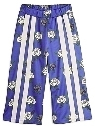 Свободные штаны с принтом цветов от бренда Mini Rodini