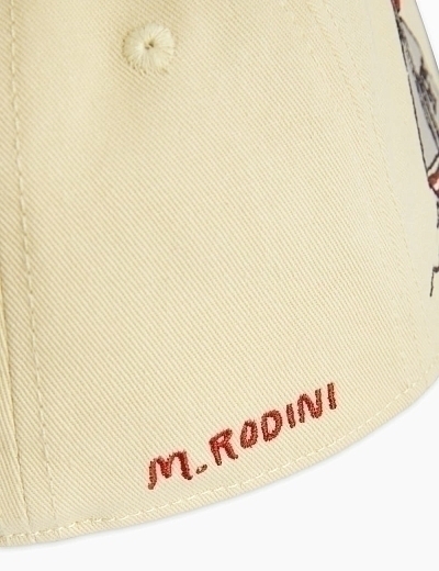 Бейсболка молочного цвета с морским принтом от бренда Mini Rodini